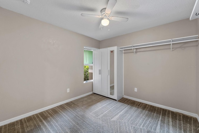 7302 Sunshine Bridge Ave, Gibsonton, FL 33534 - unfurnished bedroom with carpet, ceiling fan, and a textured ceiling