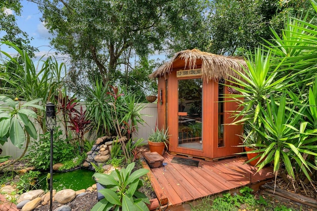 7302 Sunshine Bridge Ave, Gibsonton, FL 33534 - view of outbuilding with a small pond