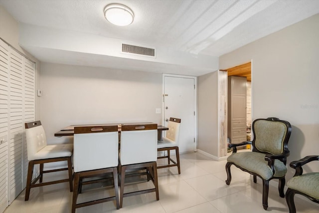 801 Russell Ln Unit 252, Brandon, FL 33510 - dining area with light tile patterned flooring and baseboards