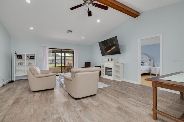 1913 Libby Ct, Holiday, FL 34690 - living area with ceiling fan, light wood-style flooring, recessed lighting, baseboards, and a glass covered fireplace