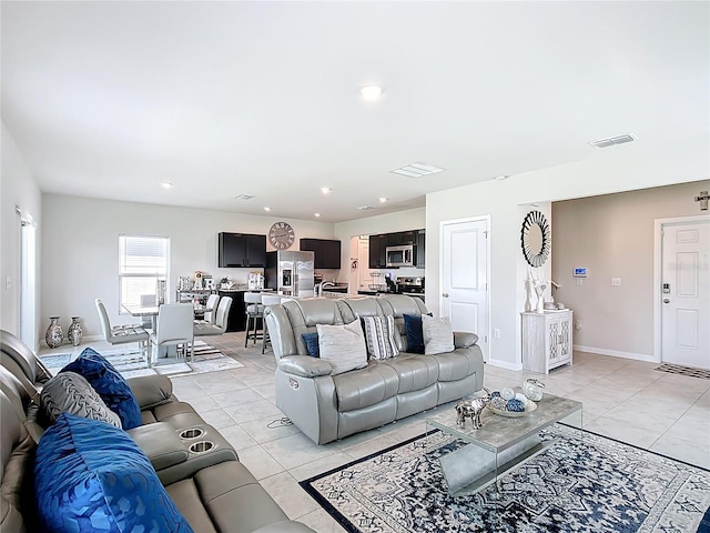 1508 Majestic Ln, Winter Haven, FL 33880 - living area with light tile patterned floors, baseboards, and recessed lighting