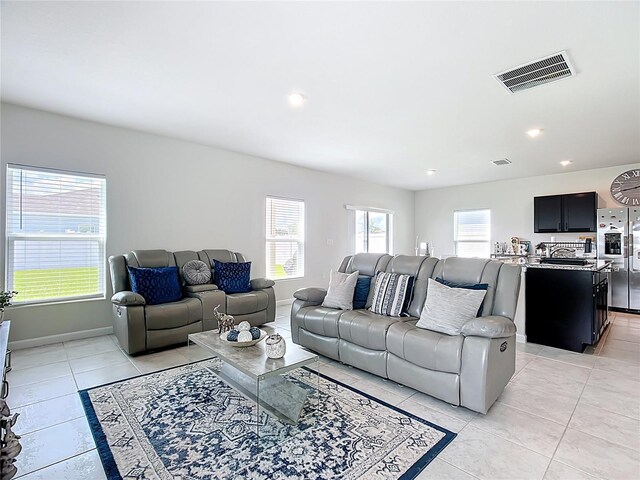 1508 Majestic Ln, Winter Haven, FL 33880 - living area featuring light tile patterned floors, baseboards, and recessed lighting