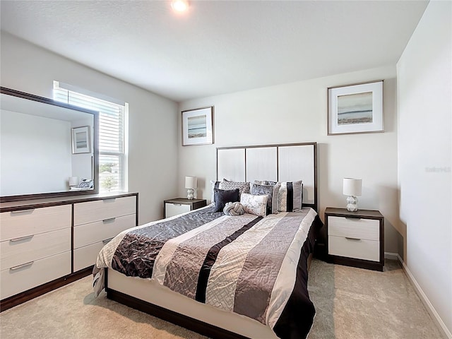 1508 Majestic Ln, Winter Haven, FL 33880 - bedroom featuring light carpet and baseboards