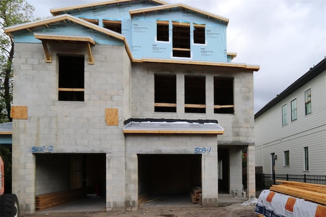 503 W Warren Ave Unit 1, Tampa, FL 33624 - view of front of property with a garage and stone siding