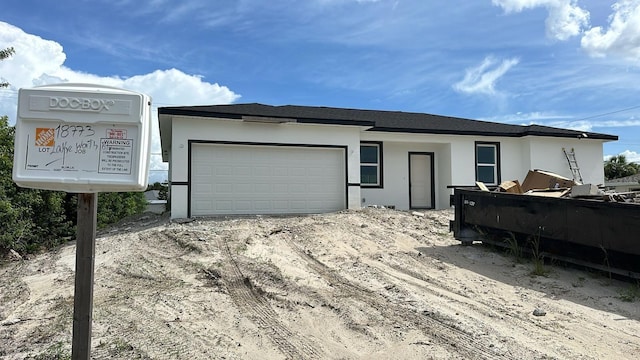 18773 Lake Worth Blvd, Port Charlotte, FL 33948 - view of front of house featuring an attached garage and stucco siding