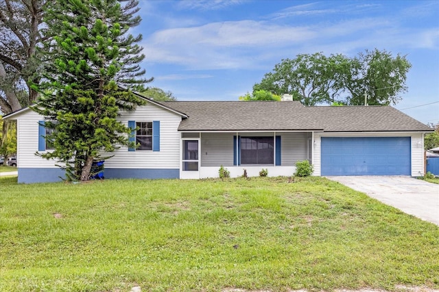 3331 Lime Tree Dr, Edgewater, FL 32141 - ranch-style home featuring an attached garage, driveway, a front yard, a chimney, and a shingled roof