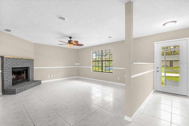 3331 Lime Tree Dr, Edgewater, FL 32141 - unfurnished living room with a textured ceiling, ceiling fan, baseboards, and light tile patterned flooring