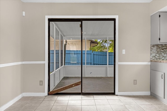 3331 Lime Tree Dr, Edgewater, FL 32141 - unfurnished dining area featuring light tile patterned floors and baseboards