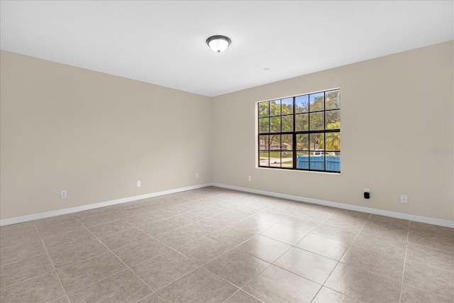 3331 Lime Tree Dr, Edgewater, FL 32141 - empty room featuring light tile patterned floors and baseboards