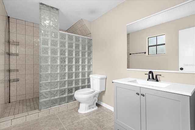 3331 Lime Tree Dr, Edgewater, FL 32141 - full bath featuring a walk in shower, toilet, vanity, tile patterned floors, and baseboards