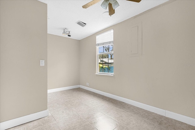 3331 Lime Tree Dr, Edgewater, FL 32141 - empty room featuring ceiling fan, baseboards, a textured ceiling, and light tile patterned floors