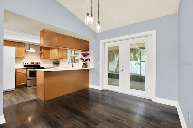 4307 Shadberry Dr, Tampa, FL 33624 - kitchen with electric range, freestanding refrigerator, wall chimney range hood, french doors, and light countertops