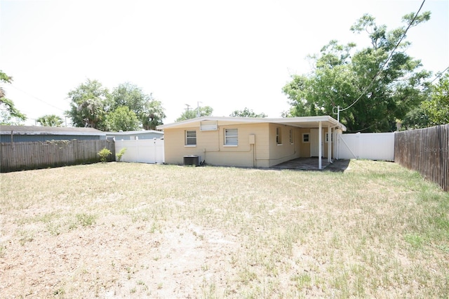 5417 Golden Dr, Tampa, FL 33634 - back of house with central air condition unit