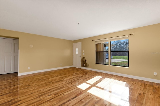 910 SE 23rd Pl, Cape Coral, FL 33990 - unfurnished room with light wood finished floors and baseboards