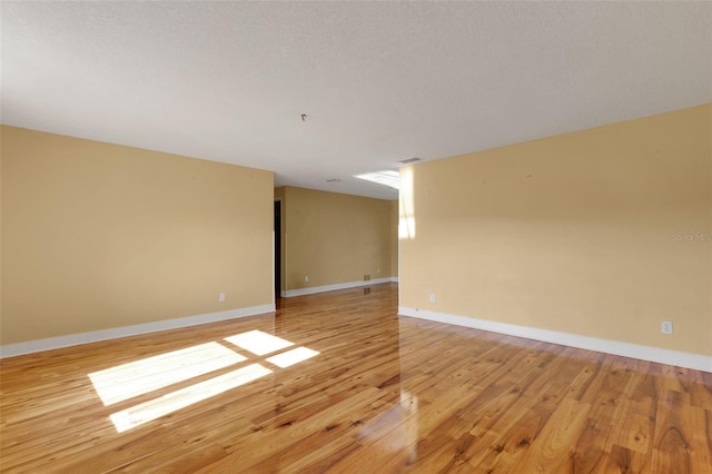 910 SE 23rd Pl, Cape Coral, FL 33990 - unfurnished room with light wood-type flooring and baseboards