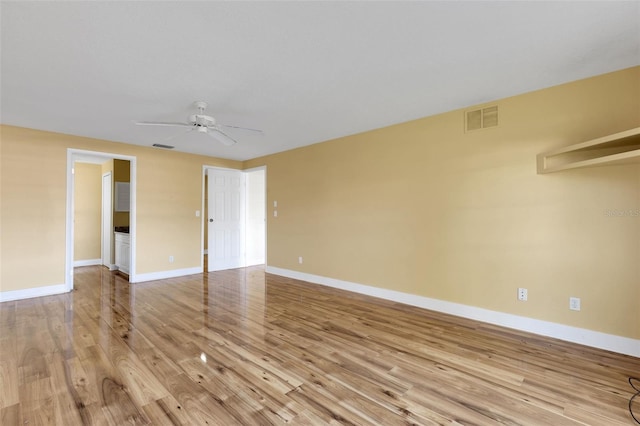 910 SE 23rd Pl, Cape Coral, FL 33990 - unfurnished room with a ceiling fan, light wood-style flooring, and baseboards