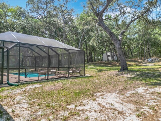 1199 E Mckinley St, Hernando, FL 34442 - view of yard featuring an outdoor pool