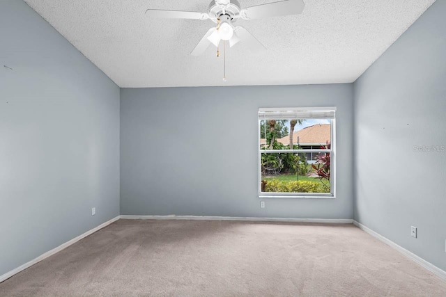 2516 New Haven Cir, Sun City Center, FL 33573 - unfurnished room with a textured ceiling, carpet floors, baseboards, and a ceiling fan