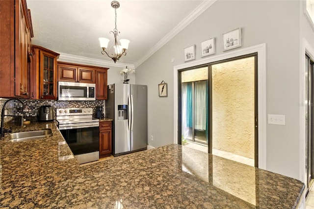 4419 Longshore Dr, Land O Lakes, FL 34639 - kitchen featuring appliances with stainless steel finishes, a sink, a chandelier, ornamental molding, and glass insert cabinets
