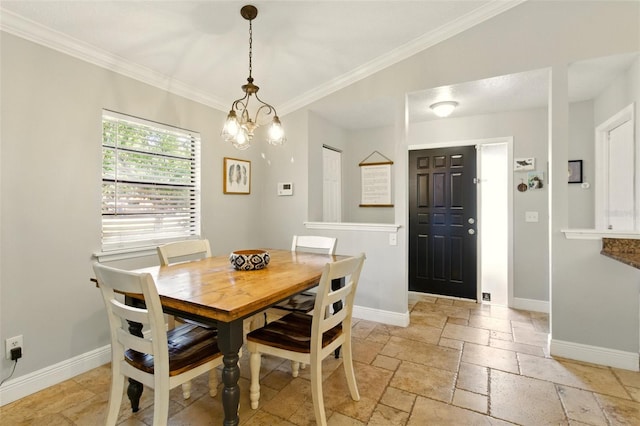 4419 Longshore Dr, Land O Lakes, FL 34639 - dining room featuring ornamental molding, stone tile flooring, baseboards, and a chandelier