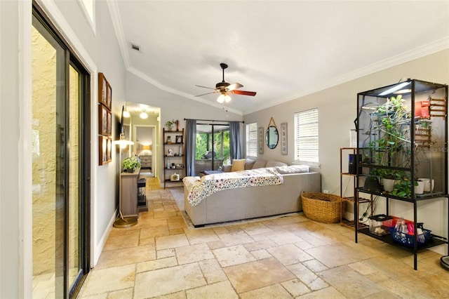 4419 Longshore Dr, Land O Lakes, FL 34639 - living area with crown molding, ceiling fan, stone tile floors, and vaulted ceiling