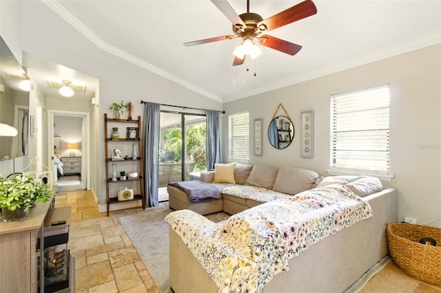4419 Longshore Dr, Land O Lakes, FL 34639 - living area with stone tile flooring, ornamental molding, a ceiling fan, and vaulted ceiling