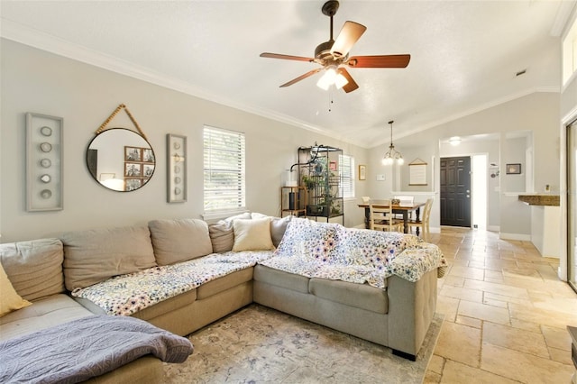 4419 Longshore Dr, Land O Lakes, FL 34639 - living room with stone tile floors, ceiling fan, crown molding, baseboards, and vaulted ceiling
