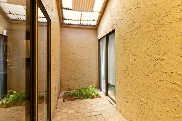 4419 Longshore Dr, Land O Lakes, FL 34639 - view of side of property with stucco siding