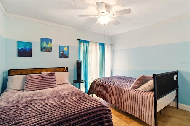 4419 Longshore Dr, Land O Lakes, FL 34639 - bedroom featuring a ceiling fan and a textured ceiling