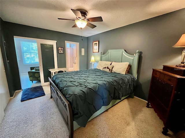 2457 Ecuadorian Way Unit 27, Clearwater, FL 33763 - carpeted bedroom with a textured ceiling, a ceiling fan, and access to exterior