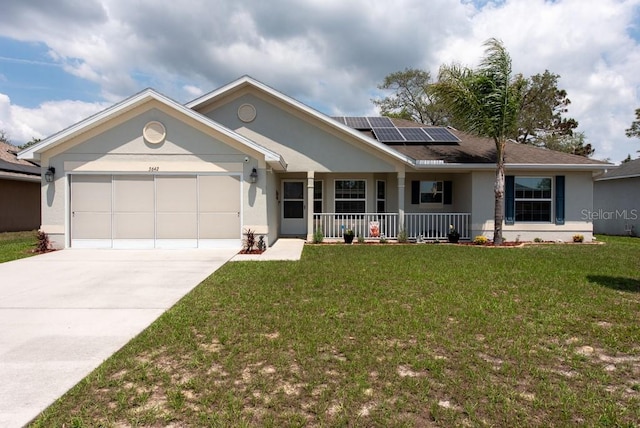 3642 Fantasy Way, Brooksville, FL 34604 - ranch-style home featuring a porch, an attached garage, a front lawn, concrete driveway, and solar panels