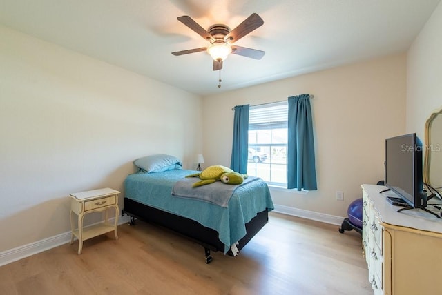 3642 Fantasy Way, Brooksville, FL 34604 - bedroom with light wood finished floors, baseboards, and a ceiling fan