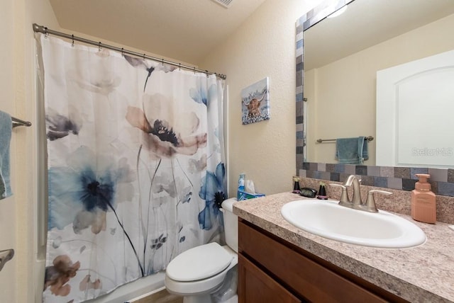 3642 Fantasy Way, Brooksville, FL 34604 - full bathroom featuring vanity, a shower with curtain, toilet, and a textured wall