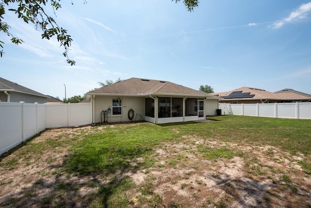 3642 Fantasy Way, Brooksville, FL 34604 - back of property with a sunroom and stucco siding
