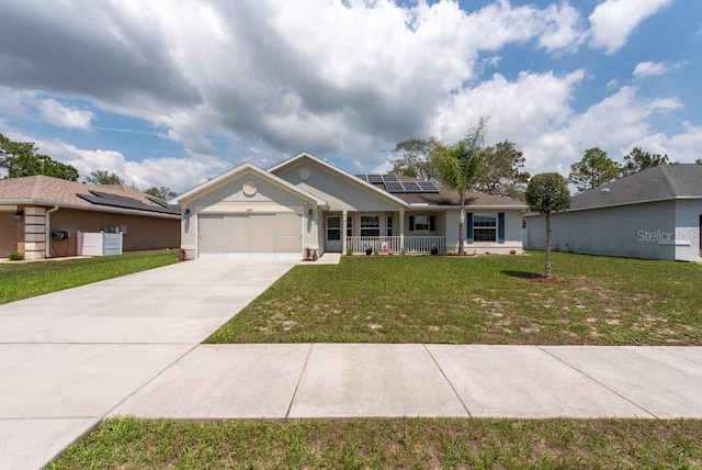 3642 Fantasy Way, Brooksville, FL 34604 - ranch-style house featuring covered porch, an attached garage, roof mounted solar panels, and a front yard