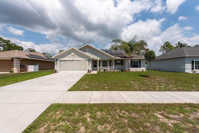 3642 Fantasy Way, Brooksville, FL 34604 - ranch-style house with covered porch, solar panels, an attached garage, a front yard, and concrete driveway