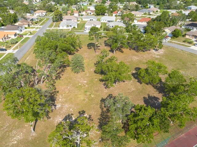 3642 Fantasy Way, Brooksville, FL 34604 - aerial view of property and surrounding area with nearby suburban area