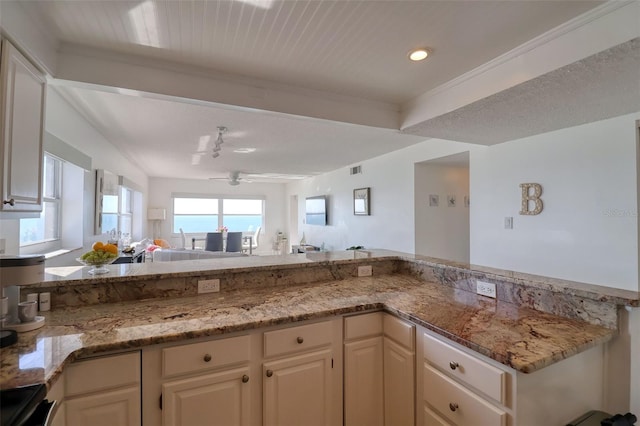 1270 Gulf Blvd Unit 1901, Clearwater Beach, FL 33767 - kitchen featuring a ceiling fan, light stone countertops, open floor plan, stainless steel electric stove, and recessed lighting