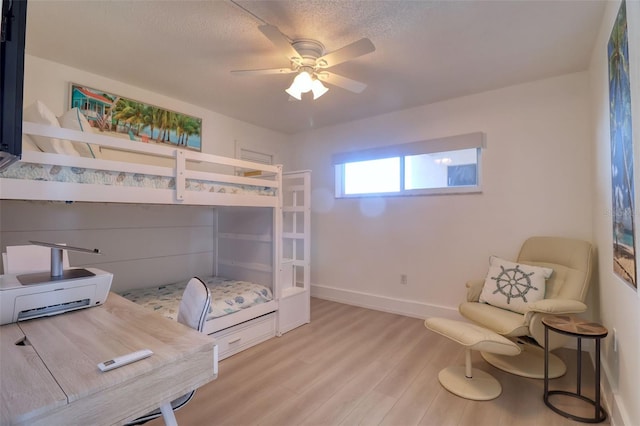 1270 Gulf Blvd Unit 1901, Clearwater Beach, FL 33767 - bedroom featuring light wood finished floors, baseboards, and ceiling fan