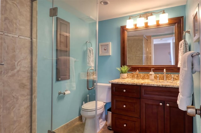 1270 Gulf Blvd Unit 1901, Clearwater Beach, FL 33767 - bathroom with vanity, toilet, and a shower stall