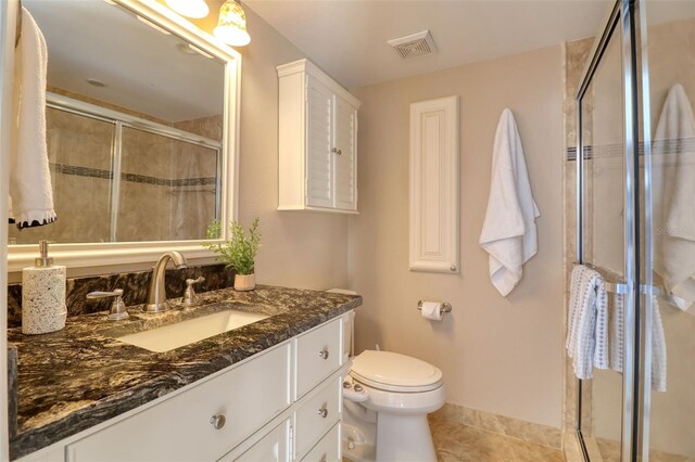 1270 Gulf Blvd Unit 1901, Clearwater Beach, FL 33767 - full bath featuring vanity, a stall shower, tile patterned floors, and toilet