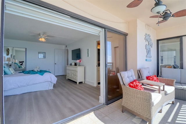 1270 Gulf Blvd Unit 1901, Clearwater Beach, FL 33767 - bedroom with a ceiling fan and wood finished floors