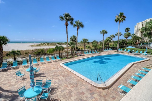 1270 Gulf Blvd Unit 1901, Clearwater Beach, FL 33767 - community pool with a patio and a water view