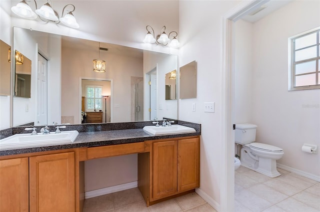 9908 Alafia River Ln, Gibsonton, FL 33534 - full bath with a bidet, double vanity, a shower stall, tile patterned flooring, and toilet