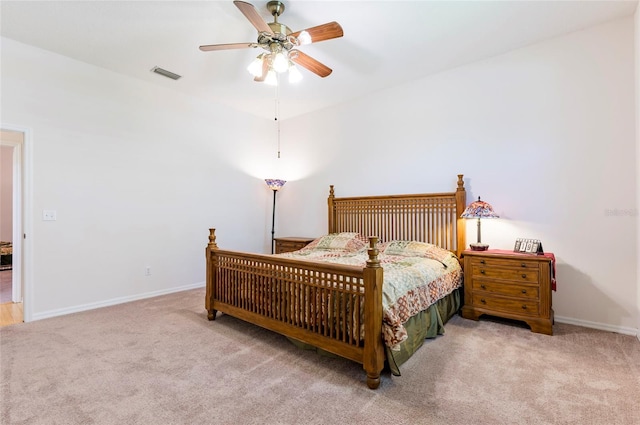 9908 Alafia River Ln, Gibsonton, FL 33534 - bedroom featuring carpet, baseboards, and a ceiling fan