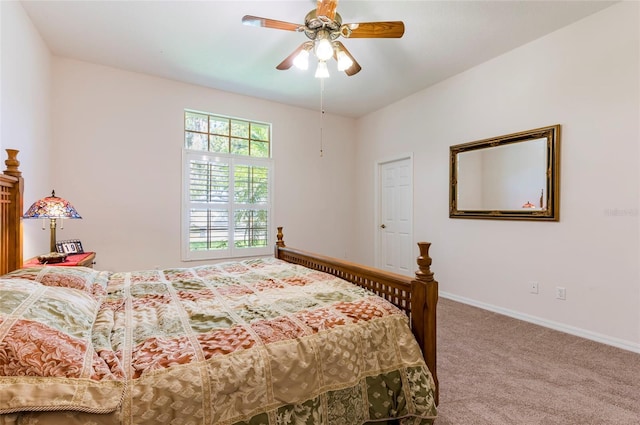 9908 Alafia River Ln, Gibsonton, FL 33534 - carpeted bedroom featuring baseboards and a ceiling fan