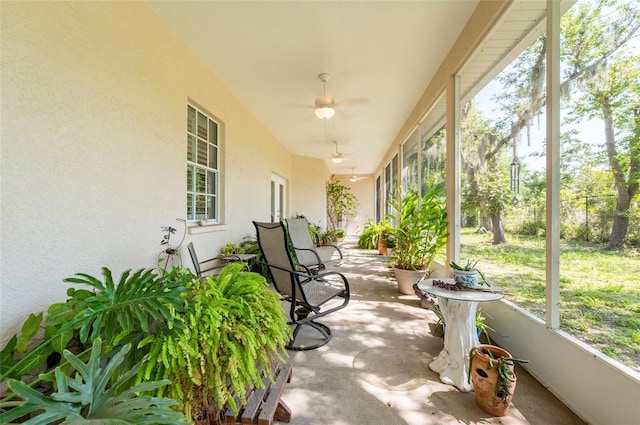 9908 Alafia River Ln, Gibsonton, FL 33534 - sunroom / solarium featuring a ceiling fan
