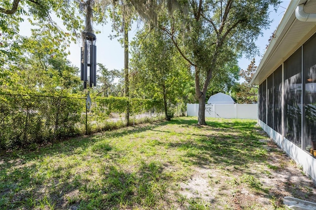 9908 Alafia River Ln, Gibsonton, FL 33534 - view of yard featuring a sunroom