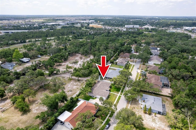 9908 Alafia River Ln, Gibsonton, FL 33534 - aerial view of property and surrounding area featuring nearby suburban area