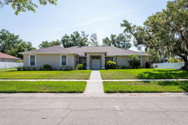 9908 Alafia River Ln, Gibsonton, FL 33534 - single story home with stucco siding